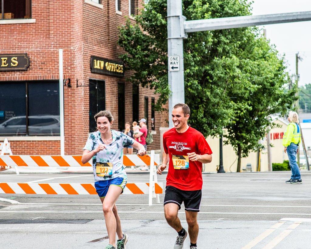 Runners near the finish line at the 2022 Run the River.