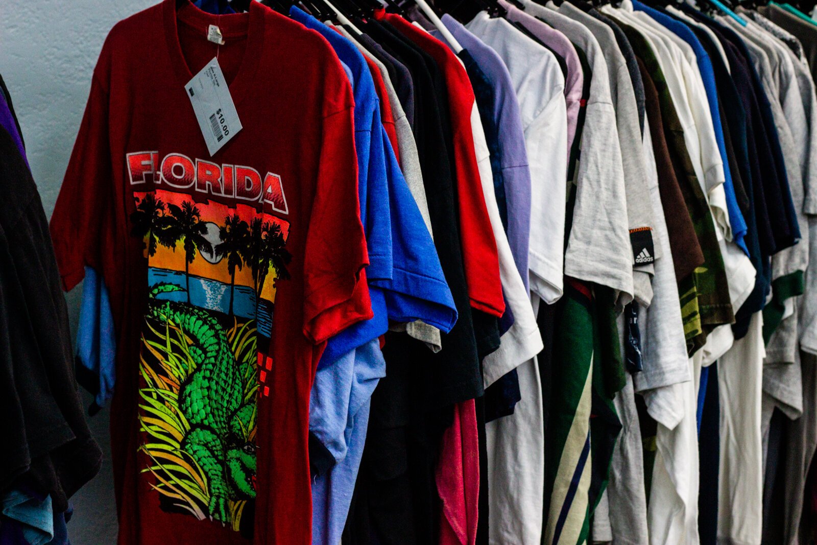 Deadstock Vintage sells a colorful assortment of sneakers, hats, tees, jeans, jackets, and knits.