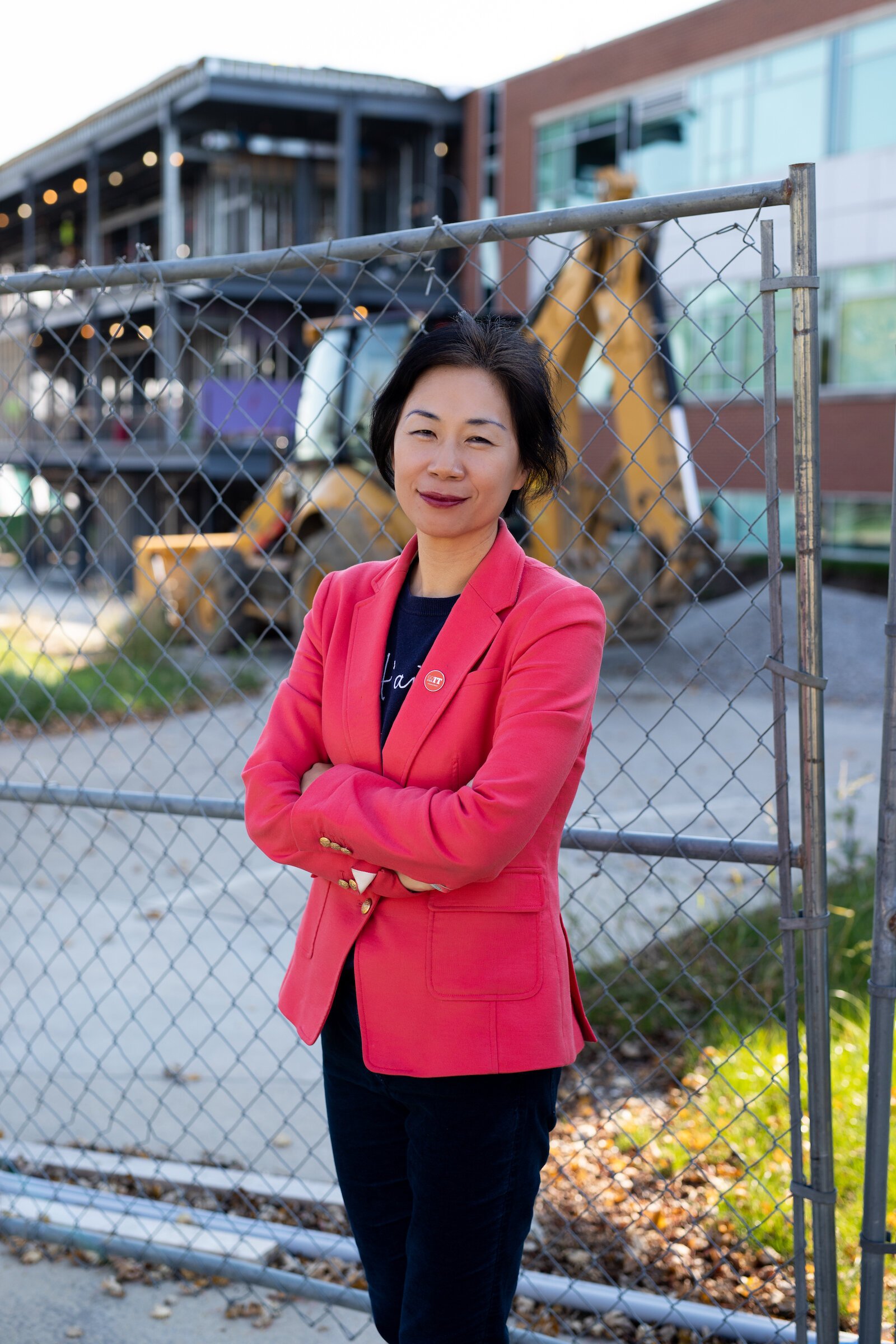 Dr. Ying Dr. Ying Shang stands in front of the Zollner Engineering Center at Indiana Tech, which is under construction to double its size.