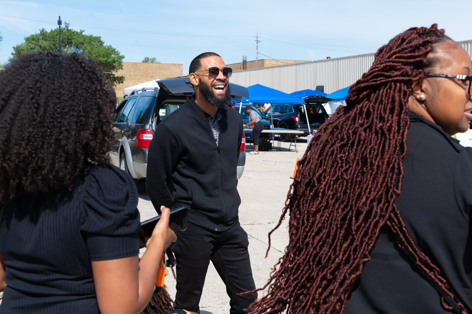 President of Young Professionals Tim Carswell chats with other members of Young Professionals at the 3rd annual Southside Love event at Link's Wonderland.